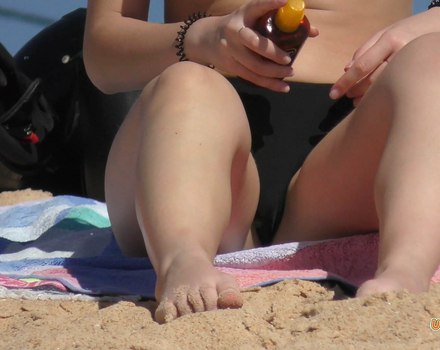 Sexy girlfriends pink bikini at the beach